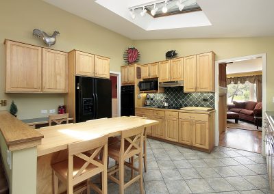 Kitchen with wood cabinetry